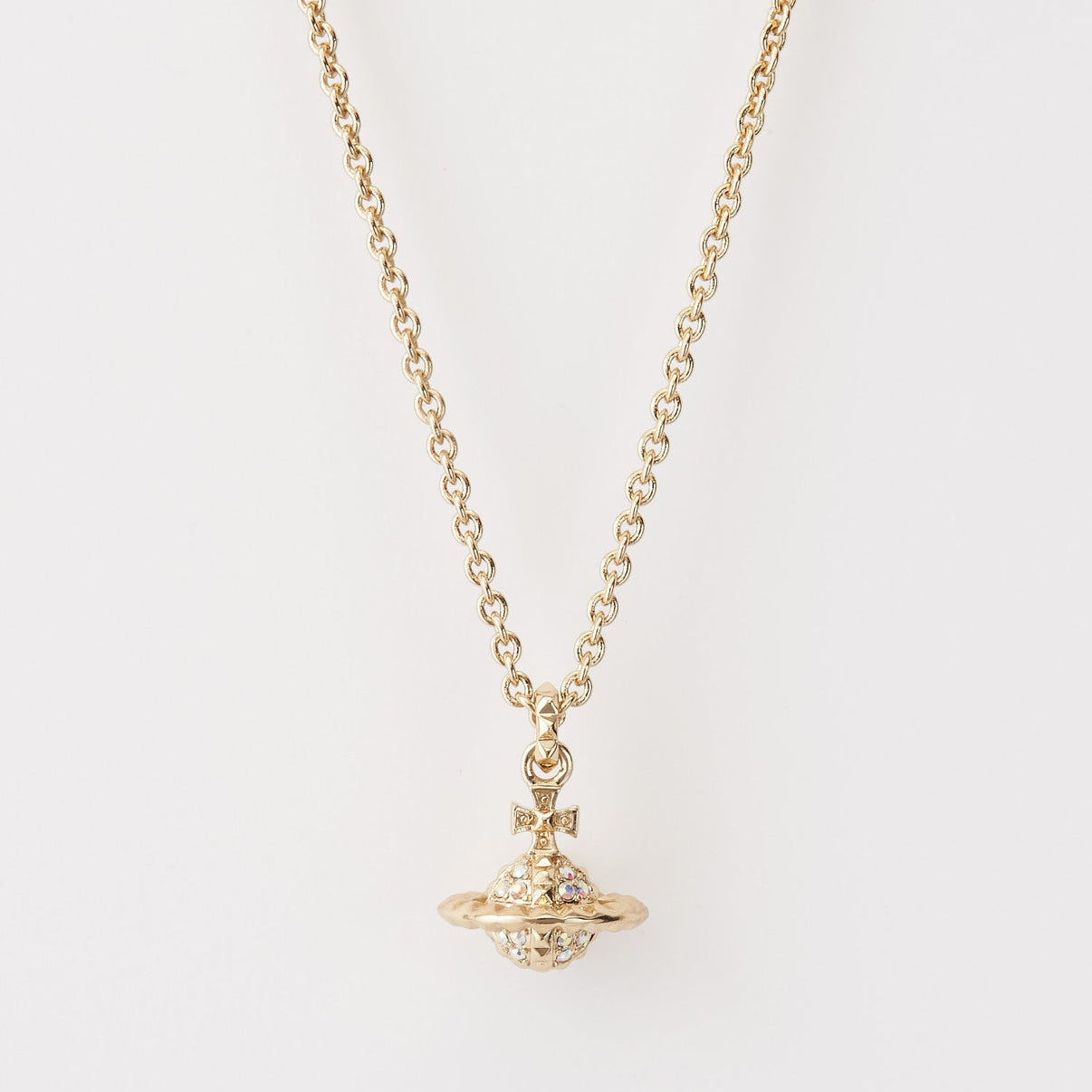 Vivienne Westwood Gold necklace with a pendant on a light gray background