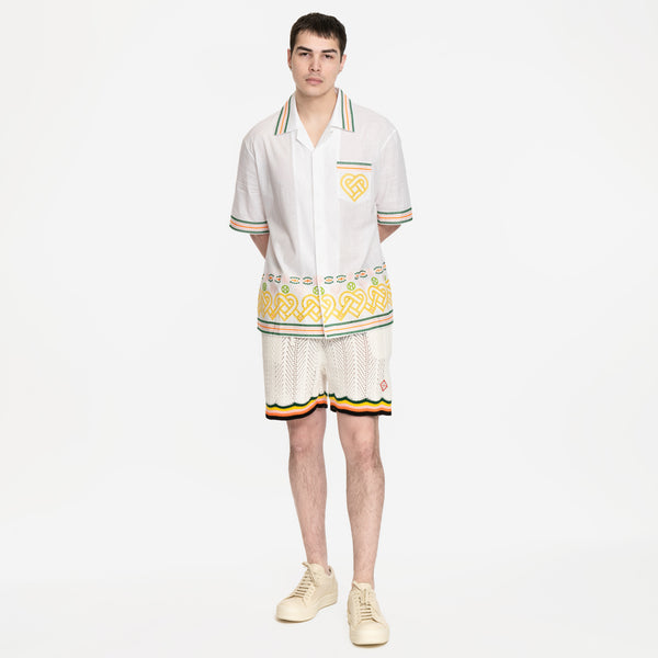 Image 4 of Casablanca Broderie Anglaise SS shirt with Casablanca knit shorts and Rick owens vintage sneakers in white