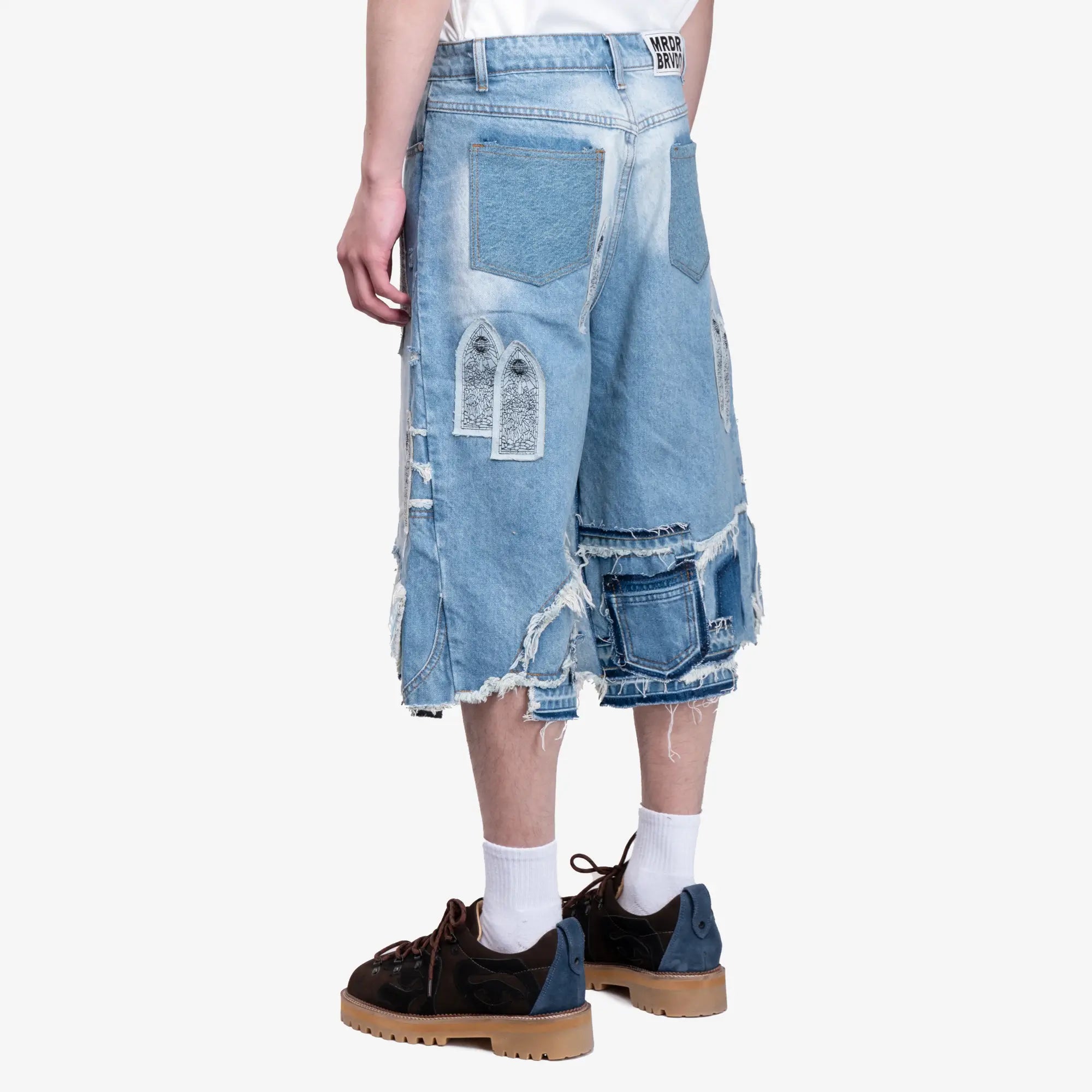 Who Decides War Patched Arch Repaired Blowout Shorts Sky - 4