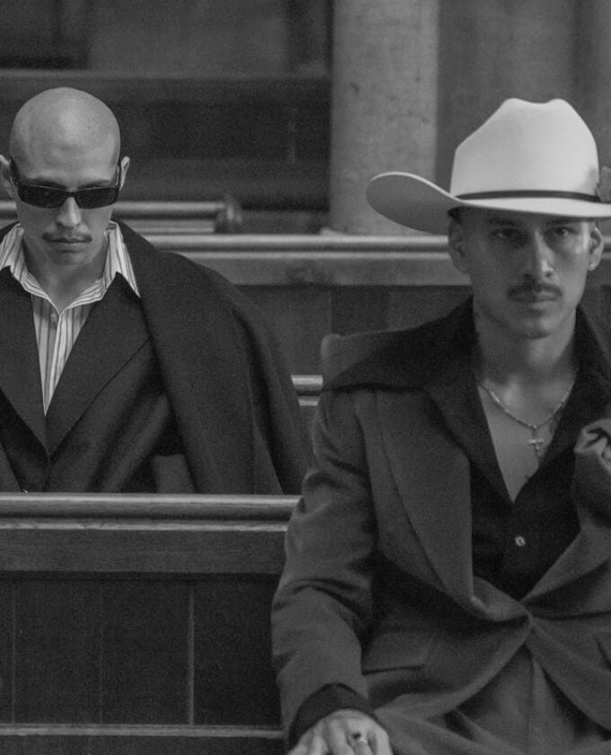 male models wearing Willy Chavarria suits and fedora hat