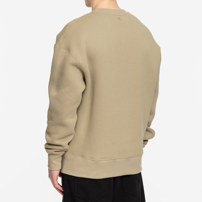 back view of crewneck sweater with embroidered AMI logo under collar 