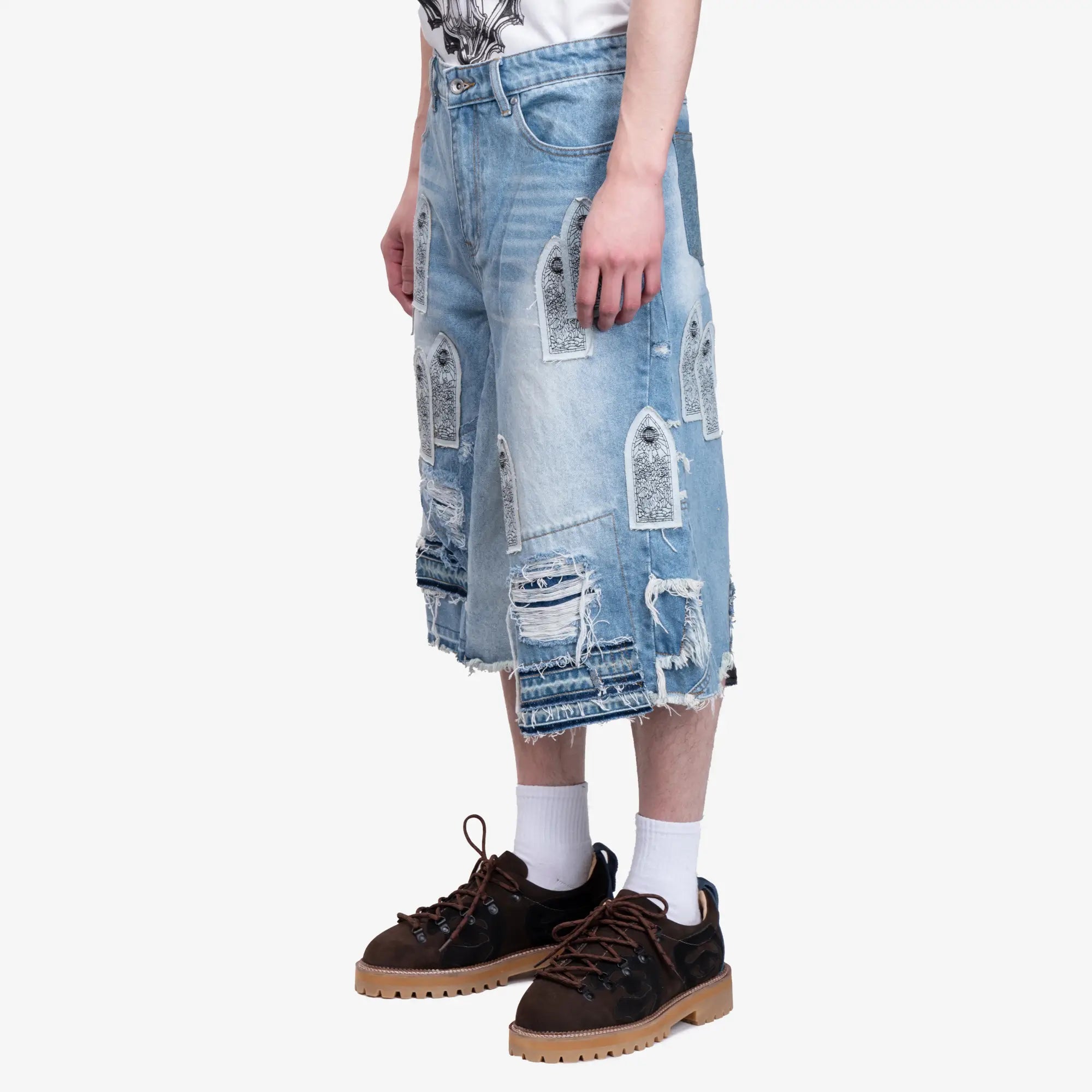 Who Decides War Patched Arch Repaired Blowout Shorts Sky - 3