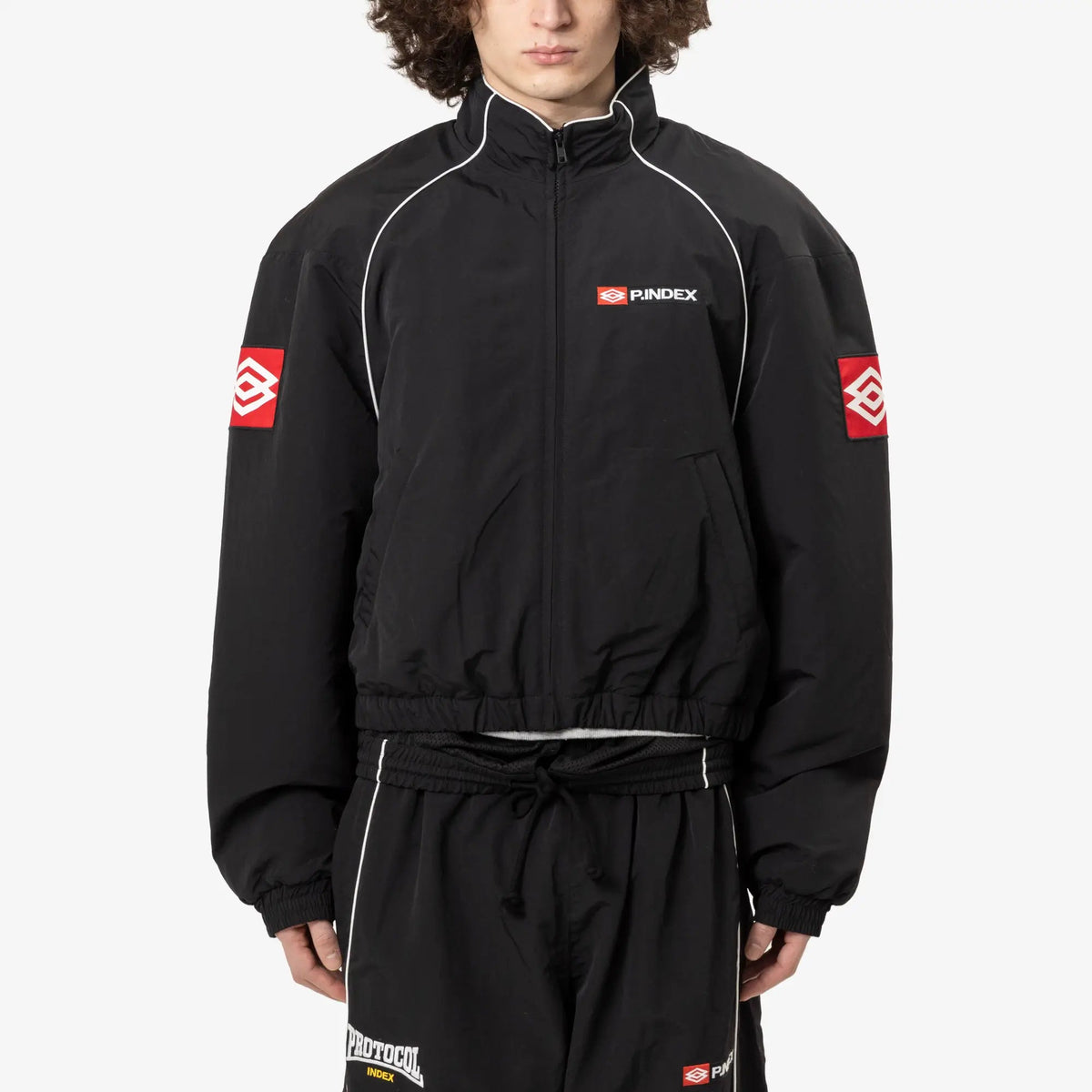 Protocol Index Exaggerated Shoulder Track Jacket in Black